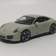 Illustration for article titled Minichamps 1/43 Porsche 911 50th Anniversary (991.1)